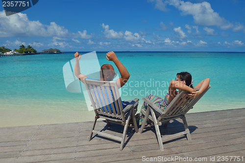 Image of happy young couple have fun on summer