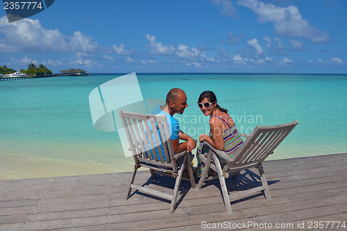 Image of happy young couple have fun on summer
