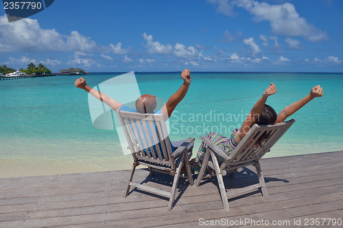 Image of happy young couple have fun on summer