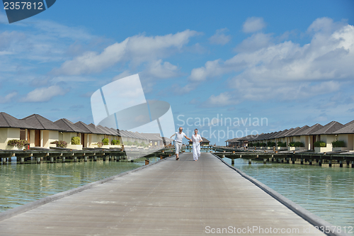 Image of happy young couple have fun on summer
