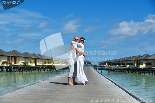 Image of happy young couple have fun on summer