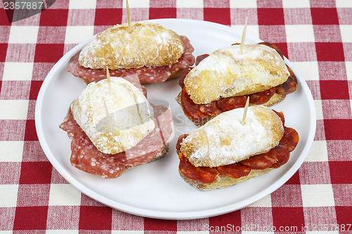 Image of Sausage sandwich, typical Basque cap.