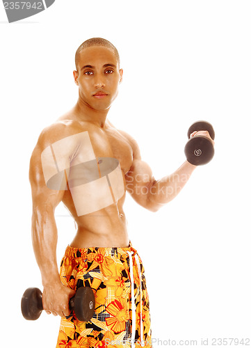 Image of Guy holding dumbbell.