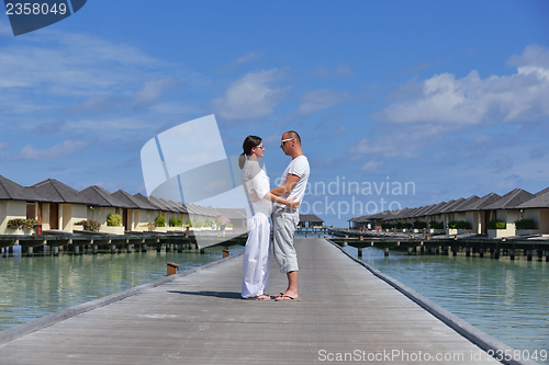 Image of happy young couple have fun on summer