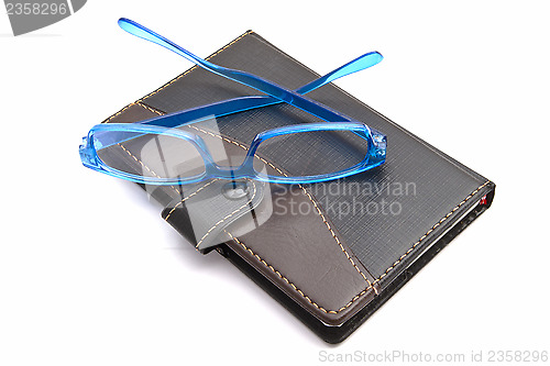 Image of Notebook and Glasses