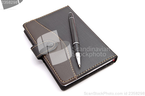 Image of Notebook and Pen