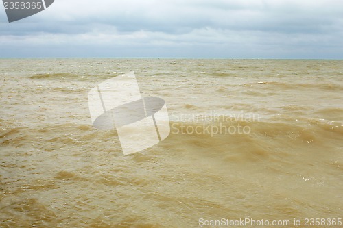 Image of Sandy seawater after the storm