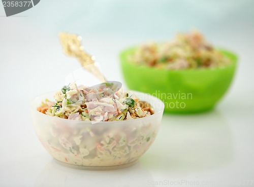 Image of two bowls of fresh salad