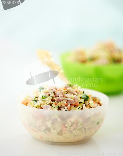 Image of two bowls of fresh salad
