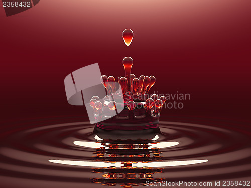 Image of Splash of red colorful liquid or wine with droplets