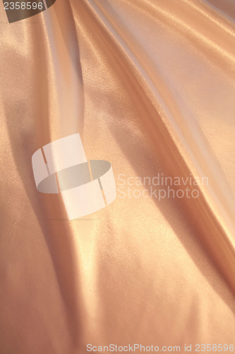 Image of Smooth elegant pink golden silk as background