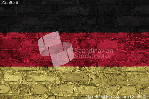 Image of German flag on brick wall