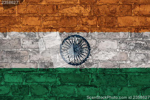 Image of Indian flag on brick wall
