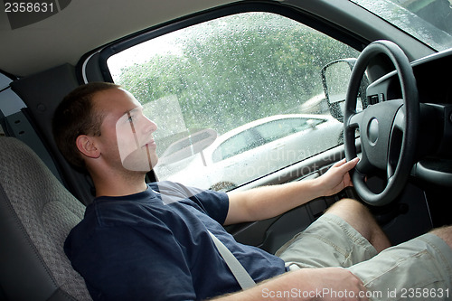 Image of Man Driving a Work Truck or Van