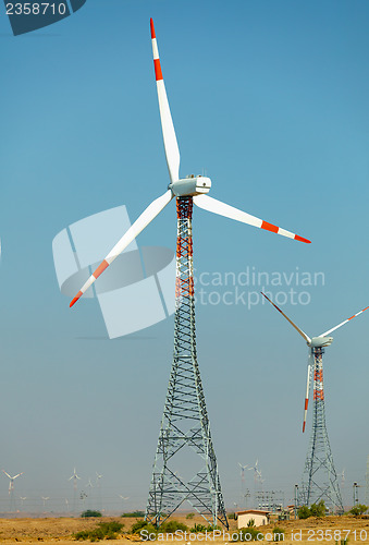 Image of Wind power stations in desert. India, Jaisalmer