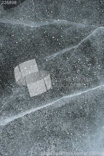 Image of Grainy snow covering cracked ice