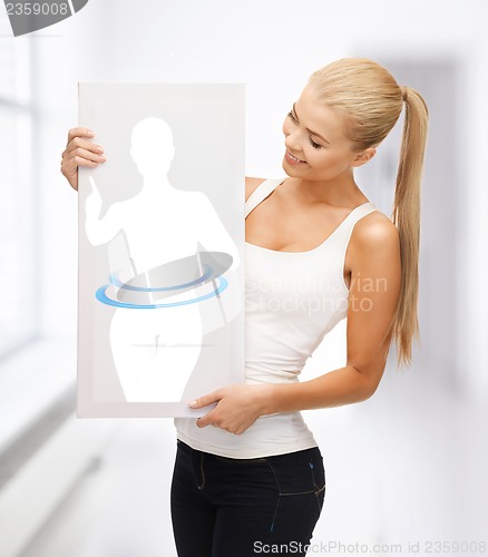 Image of woman holding picture of dieting woman