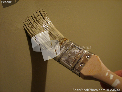 Image of Paint brush painting a wall