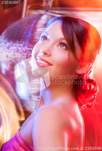 Image of woman with disco ball