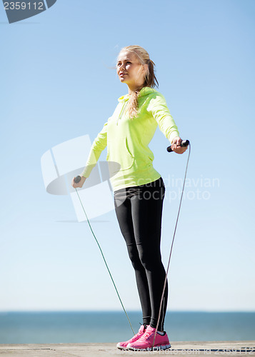 Image of woman doing sports outdoors