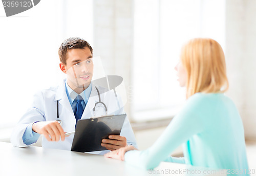 Image of male doctor with patient