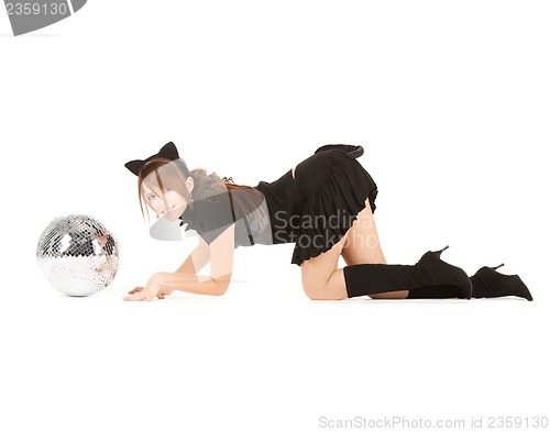 Image of girl in cat costume with glitter ball