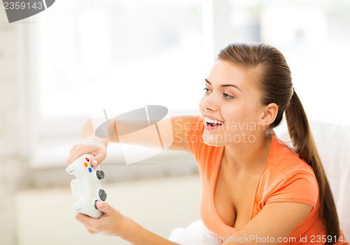 Image of woman with joystick playing video games