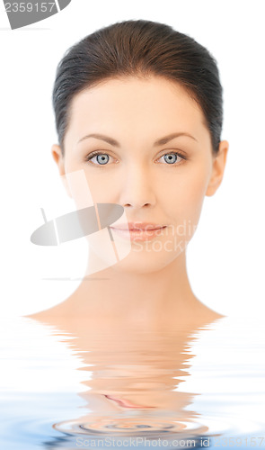 Image of face of beautiful young brunette woman