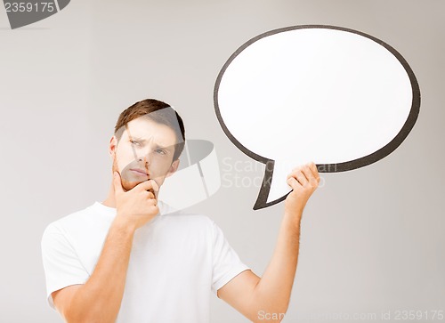 Image of young man with blank text bubble