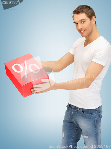 Image of man with big percent box