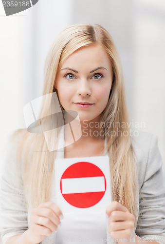 Image of woman with no entry sign