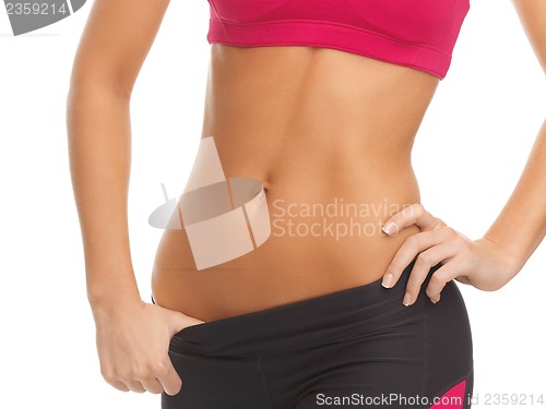 Image of woman trained abs