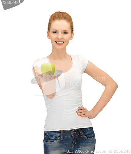 Image of woman in blank t-shirt eating green apple