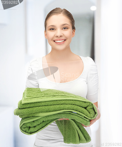 Image of lovely girl with towels