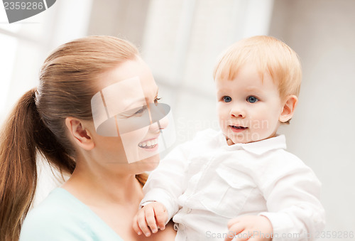 Image of happy mother with adorable baby