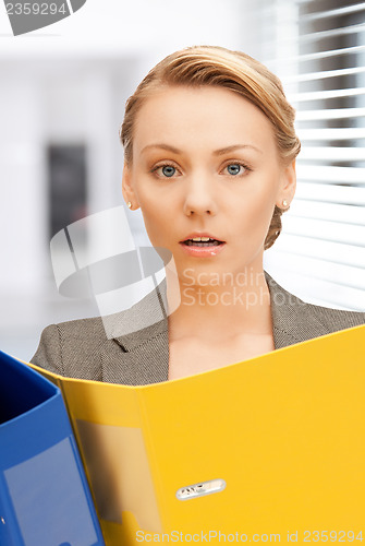 Image of woman with folders