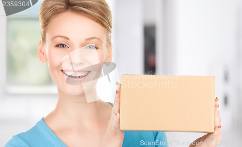 Image of businesswoman with parcel