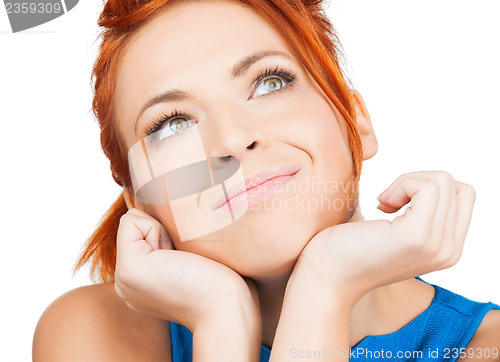 Image of happy woman dreaming