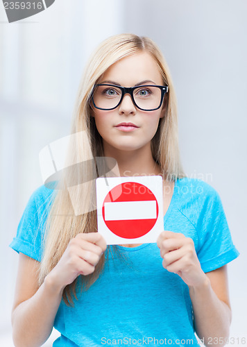 Image of woman with no entry sign