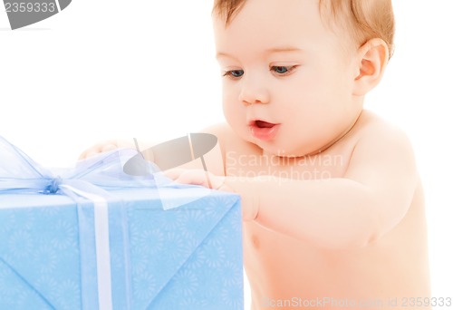 Image of happy child with gift box