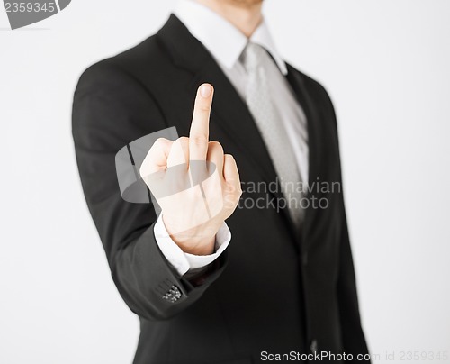 Image of man showing middle finger