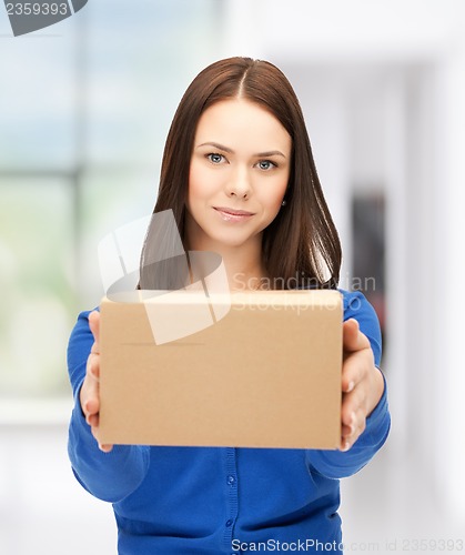 Image of businesswoman delivering box