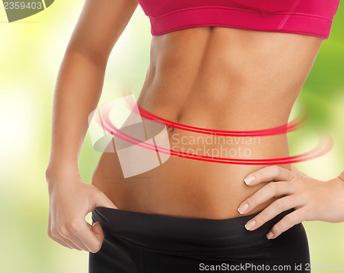 Image of woman trained abs