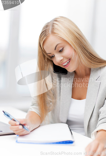 Image of businesswoman with phone