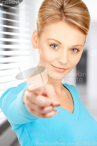 Image of businesswoman pointing her finger