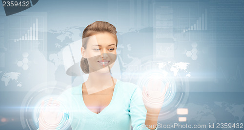 Image of businesswoman working with virtual screens