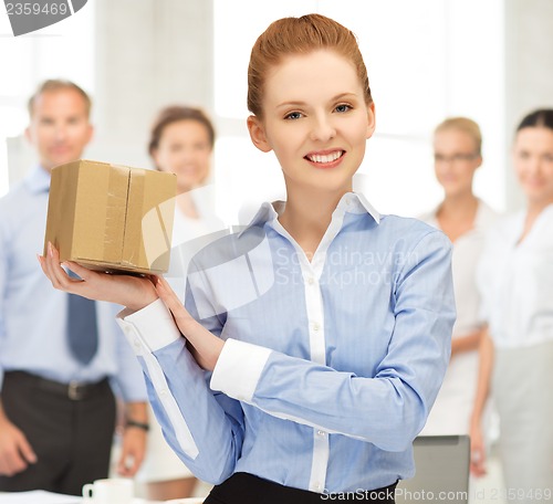 Image of woman with cardboard box