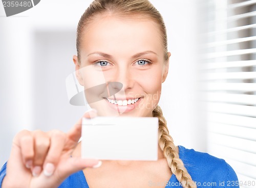 Image of happy woman with business card