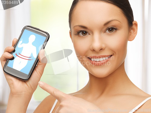 Image of woman pointing at smartphone with application