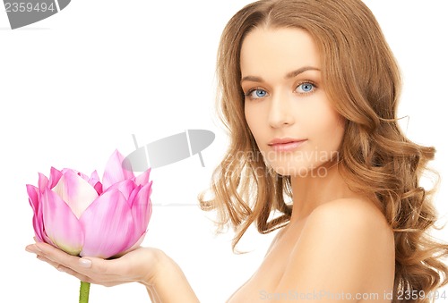 Image of lovely woman with lotos flower